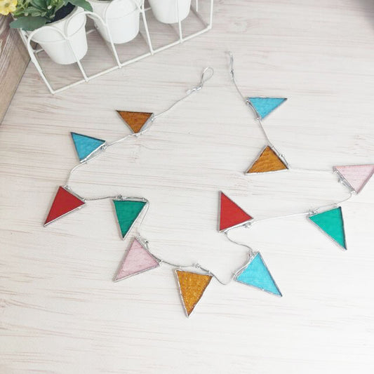 garland of stained glass triangles bright Christmas decoration